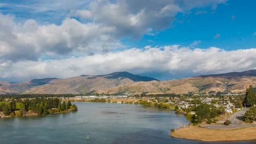 Timelapse of rainbow above river