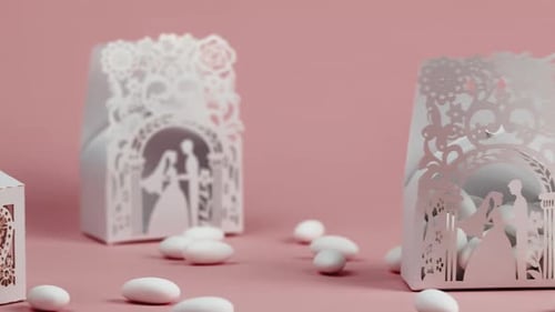 Decorative Wedding Favor Boxes on Pink Surface