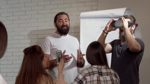 Business People Using Virtual Reality Glasses During Conference at the Office