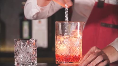 Bartender Mixing a Cocktail at a High End Bar
