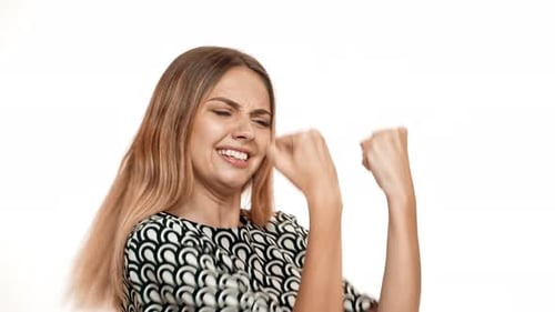Woman Celebrates Good News, Happy and Exuberant