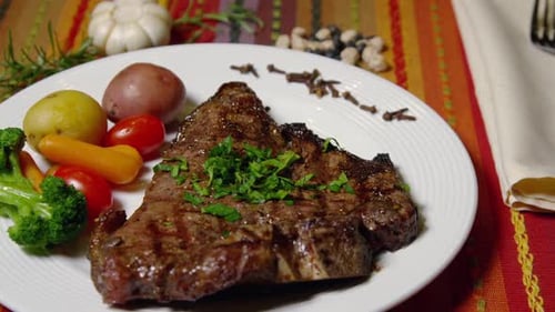 Gourmet Steak on a Plate Garnished with Herbs
