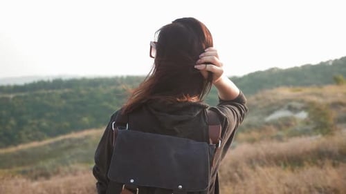 Woman Enjoying Scenic View in Rural Area