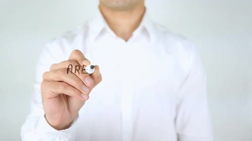 Man Writing Are You Spying On Me