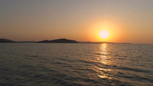 Sun Reflecting Off Sea Waves and Creating Sun Path in the Water