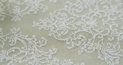 Close Up of White Lace Floral Fabric