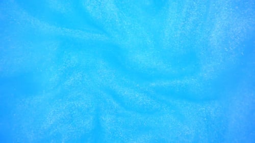 Light Blue Glittering Liquid Abstract Background