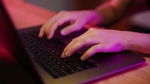 Woman Typing on PC Keyboard