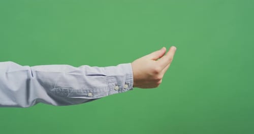 Hand Pinches Fingers Together on Green Screen