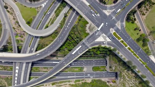 Timelapse of a Massive multi level highway interchange with traffic on all routes, Aerial view.