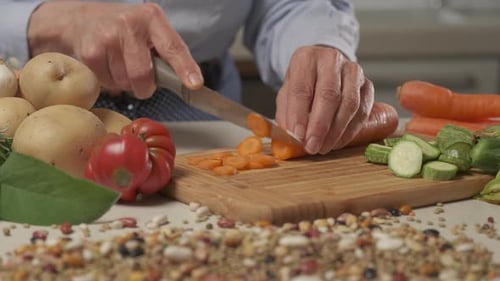 Slicing Carrots on a Cutting Board