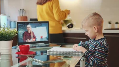 Boy Learning Online at Home with Laptop