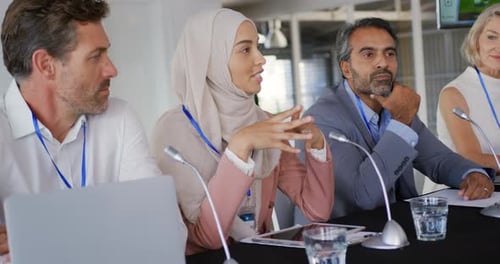 Panel Discussing Business at a Conference