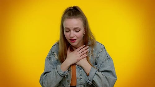 Young Woman with Sore Throat and Headache