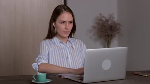 Woman Works From Home on Video Conference