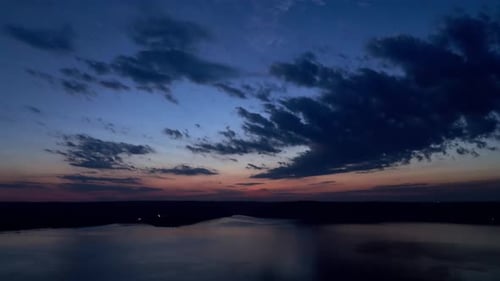 Clouds Moving Above Evening Lake, Sunset.