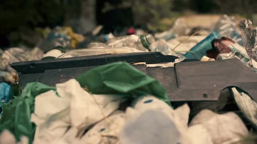 Pile of Waste and Litter Polluting Natural Environment