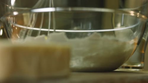 Mixing Flour and Butter in Bowl for Baking