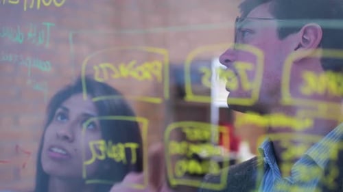Business Team Brainstorming Together in Modern Office