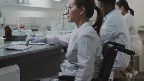 Scientists Working in Lab Environment