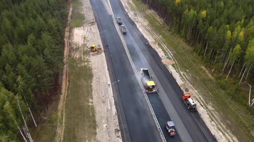 Building New Highway Through Rural Forest, Aerial View