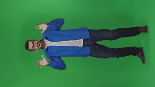 Enthusiastic Man Gesturing on a Green Screen