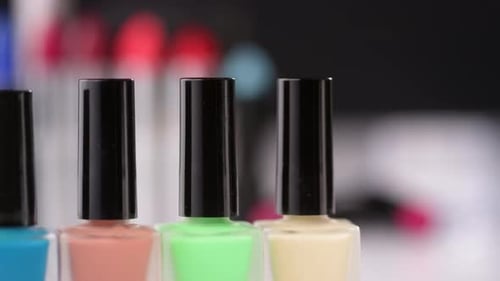 Colorful Nail Polish Bottles in a Row