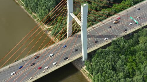 Modern cable stayed bridge and car traffic on background. Highway traffic jam. Aerial View