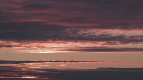 Time lapse of beautiful scenic fasting clouds after the sunset, medium shot