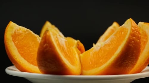 Fresh Orange Slices on Plate