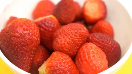 healthy and tasty strawberries in the bowl - close up