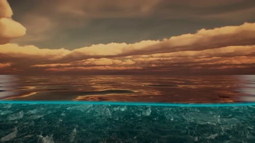 Split View Over and Under Water in the Caribbean Sea with Clouds