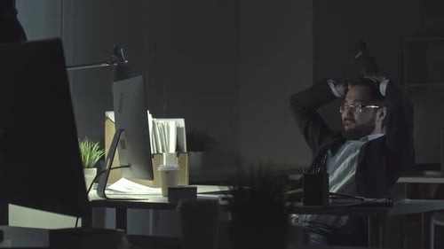 Man Tired but Trying to Work