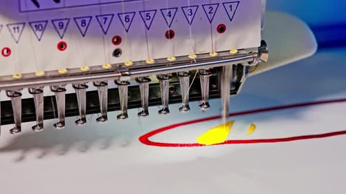 Embroidery Machine Stitching Design on Fabric Close Up