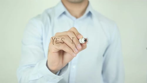 Yes I Can, Man Writing on Screen