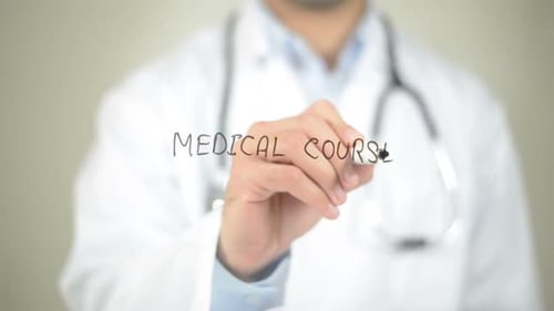 Doctor Writes 'Medical Courses' on Clear Surface