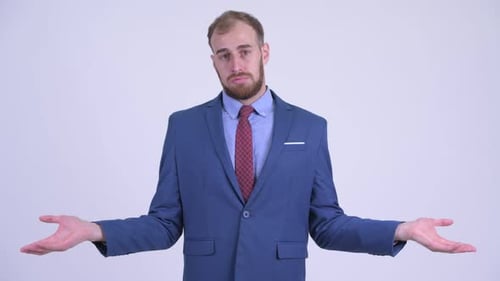 Young Adult Businessman Talking in Front of a White Background