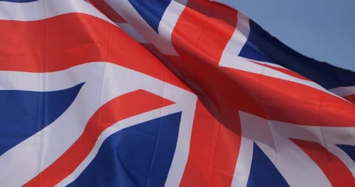 Waving British Flag Closeup in Daylight
