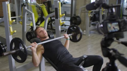 Man Doing Bench Press Filmed at the Gym