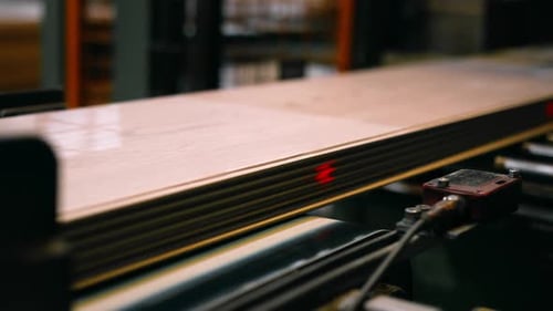 Flooring Panels on Conveyor Belt in Factory