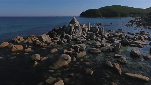 Aerial Shot of Coastline Bay with the Rocks and Cliffs