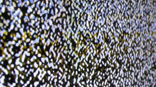 Television Screen Showing Colorful Static Close Up