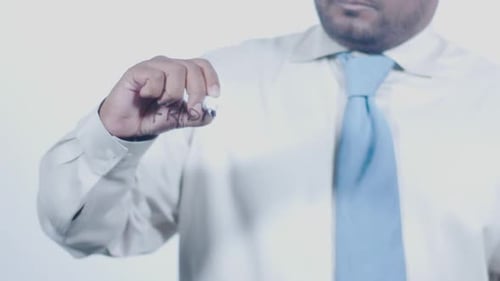 Man Writes Friday With Marker