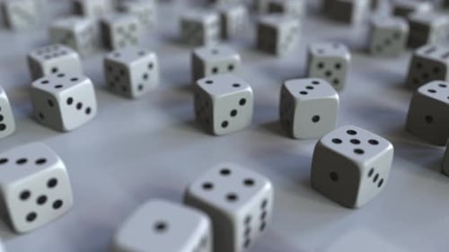 Dice with Dollar Sign Among Scattered Gambling Dices