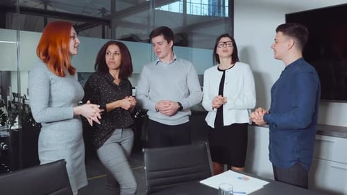 Business Team Discussing Project in Modern Office