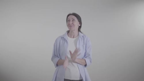 Portrait of Cheerful Adult Caucasian Woman Laughing Out Loud at White Background, Joyful Happy