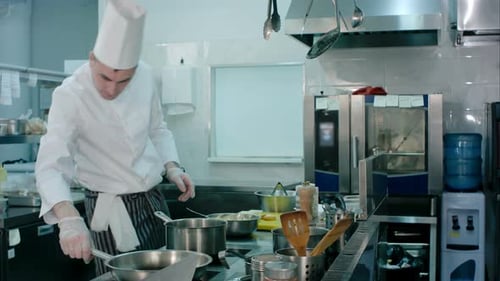 Chefs Preparing Food in Commercial Kitchen