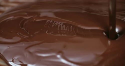 Decadent Melted Chocolate Ripples as It is Poured