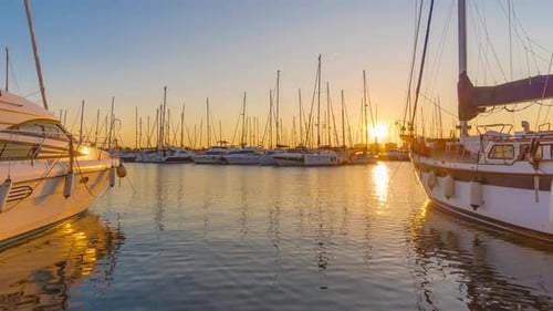 Time Lapse. Sunset Scene at Marina with Yachts Tied To the Docks, Sun and Sky Beautiful Color