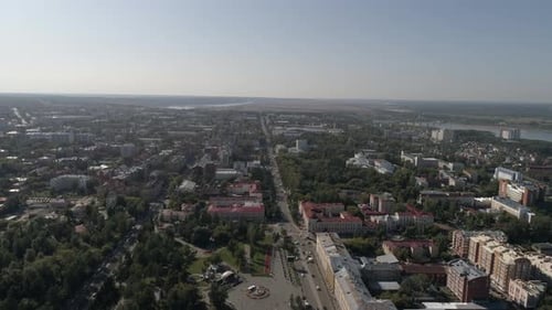 Aerial view of city with lots of trees and river 08
